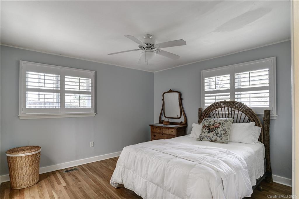 215 Rutledge Drive Hendersonville, NC 28739 - Photo 25 of 31 a bedroom with a bed and a window