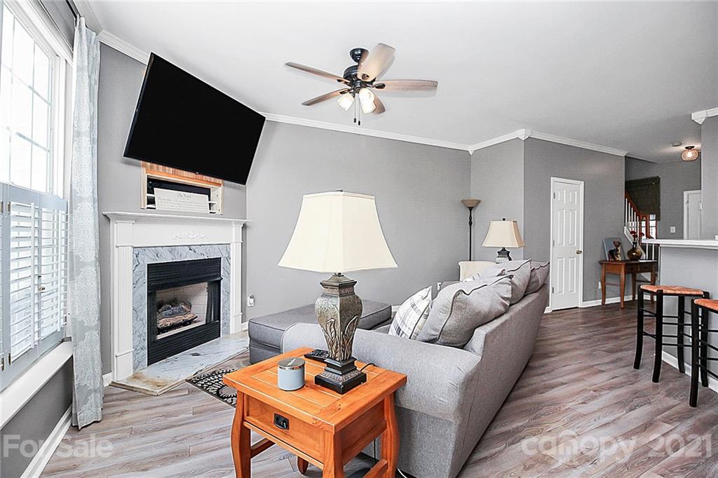 911 Azurine Circle, Unit 74 Fort Mill, SC 29708 - Photo 20 of 40 a living room with furniture fireplace and flat screen tv