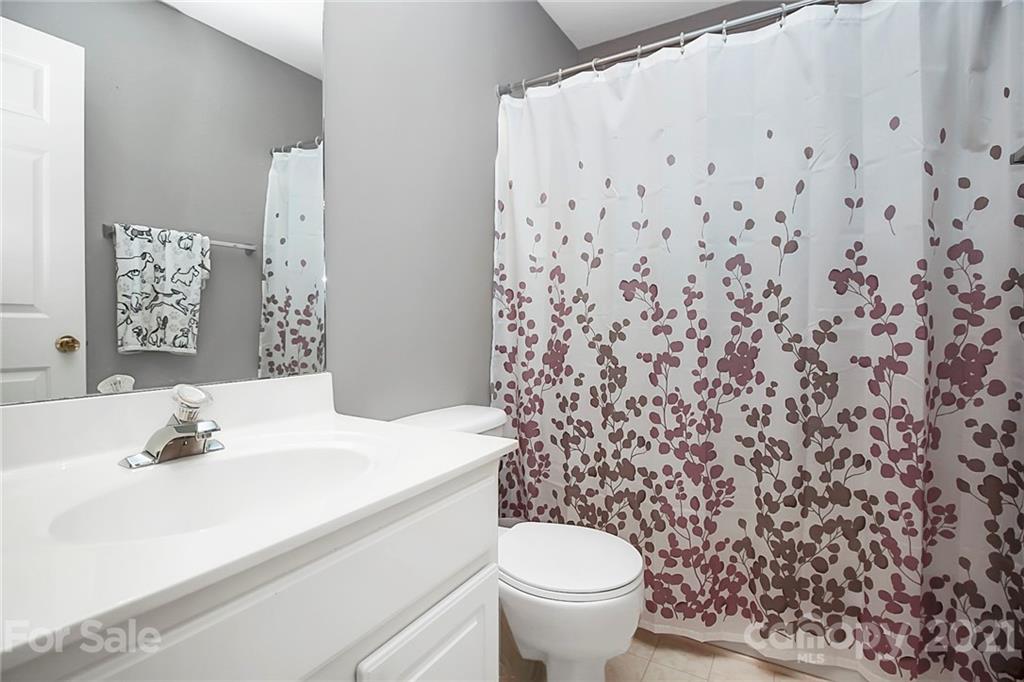 911 Azurine Circle, Unit 74 Fort Mill, SC 29708 - Photo 33 of 40 a bathroom with a sink toilet and shower