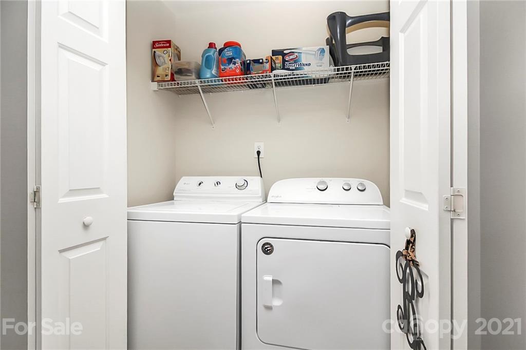 911 Azurine Circle, Unit 74 Fort Mill, SC 29708 - Photo 34 of 40 a utility room with dryer and washer