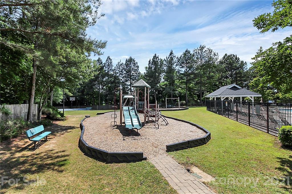 911 Azurine Circle, Unit 74 Fort Mill, SC 29708 - Photo 40 of 40 a view of a swimming pool with a patio