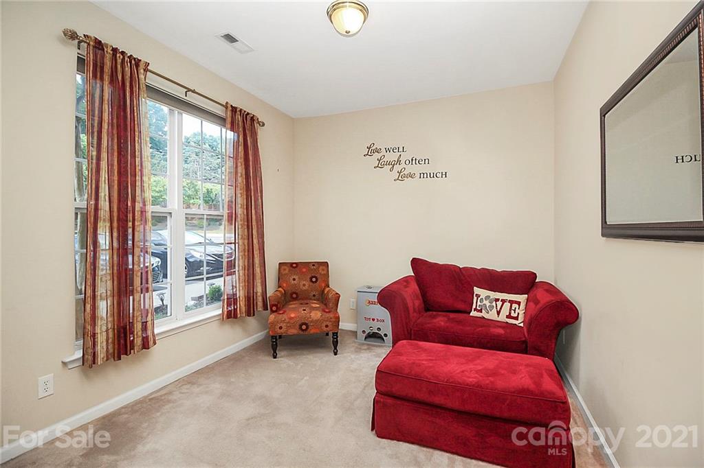 911 Azurine Circle, Unit 74 Fort Mill, SC 29708 - Photo 6 of 40 a living room with furniture and a window