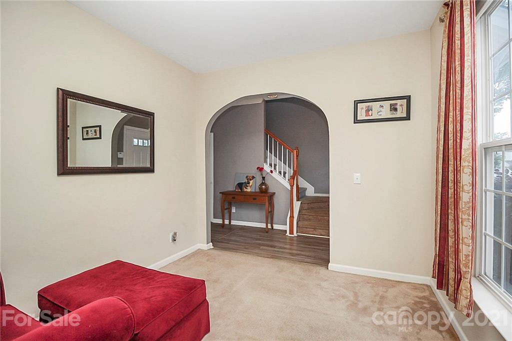 911 Azurine Circle, Unit 74 Fort Mill, SC 29708 - Photo 7 of 40 a bedroom with a bed and a painting on the wall