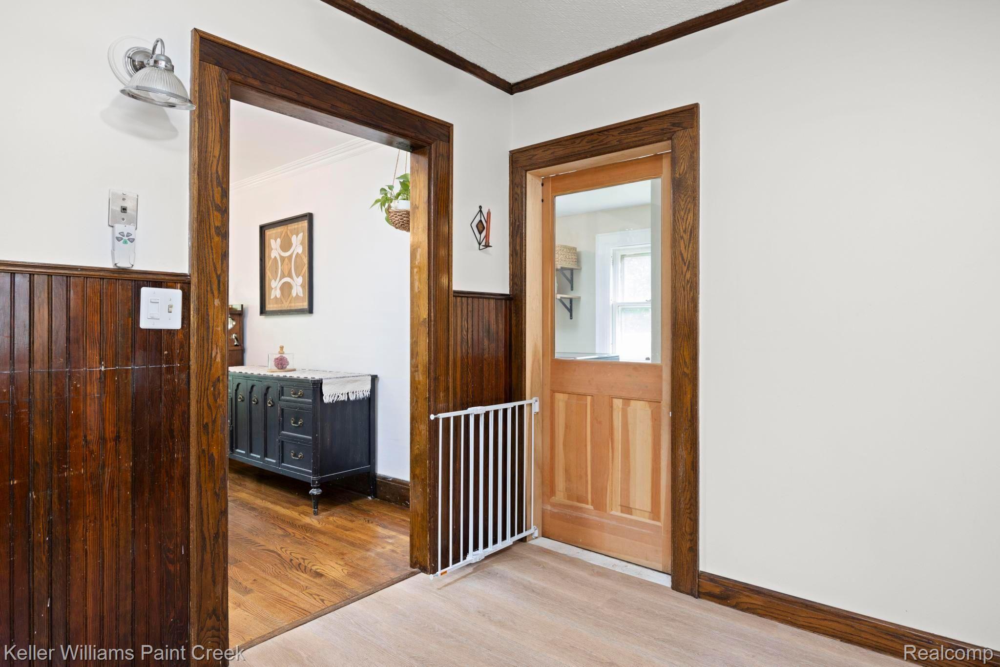 167 West Washington Street Romeo, MI 48065 - Photo 17 of 45 Sliding Farmhouse Door from Kitchen to Laundry Rm