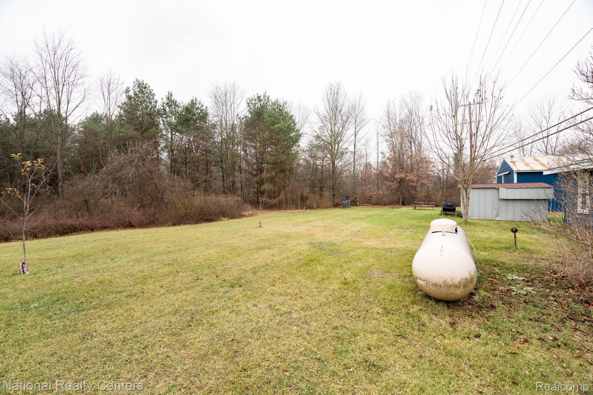480 Brewer Road Leonard, MI 48367 - Photo 20 of 30 Great yard for entertaining