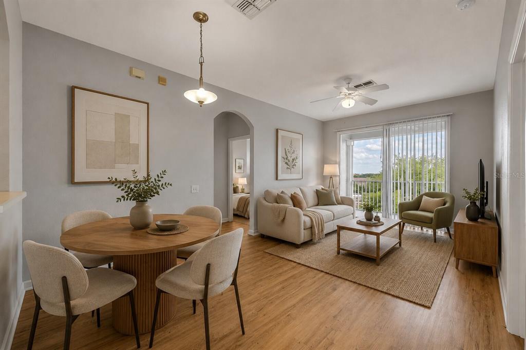582 Brantley Terrace Way, Unit 304 Altamonte Springs, FL 32714 - Photo 2 of 30 a living room with furniture and a large window