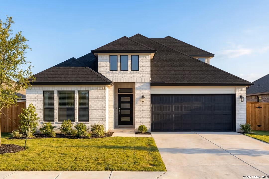 401 Tims Way Seguin, TX 78155 - Photo 1 of 50 a front view of a house with a yard
