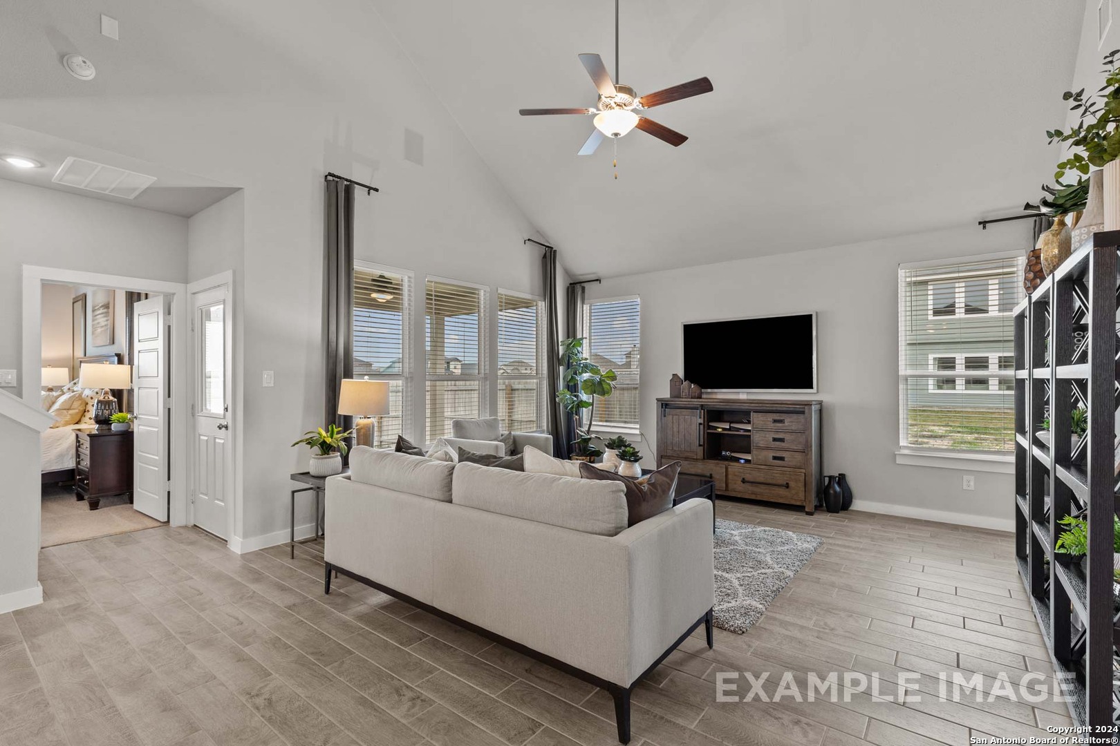 401 Tims Way Seguin, TX 78155 - Photo 11 of 50 a living room with furniture and a flat screen tv