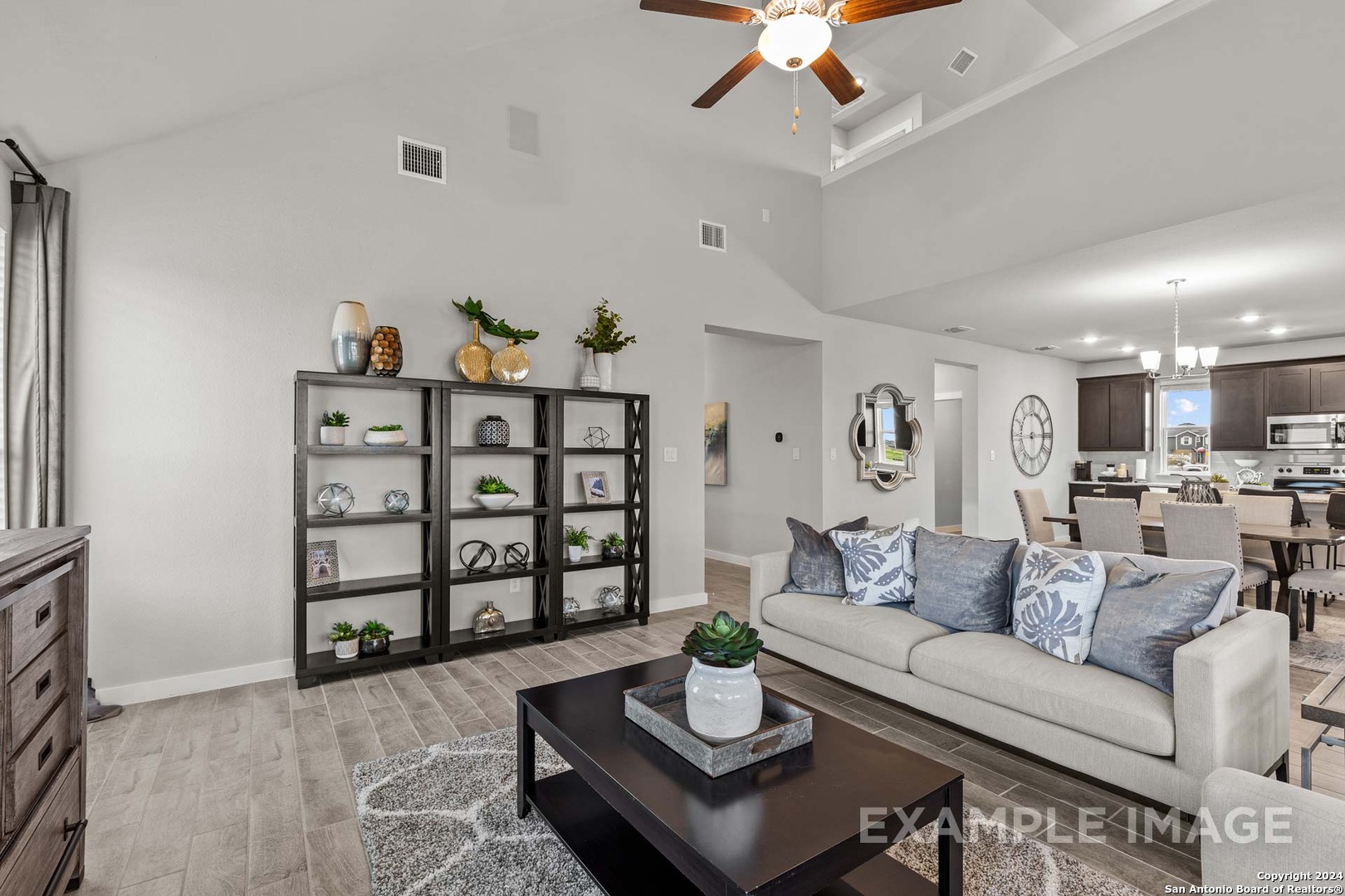 401 Tims Way Seguin, TX 78155 - Photo 16 of 50 a living room with furniture and wooden floor