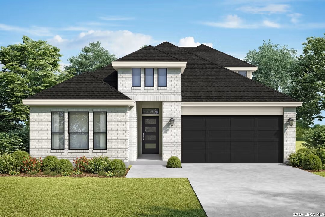 401 Tims Way Seguin, TX 78155 - Photo 2 of 50 a front view of a house with a yard and garage