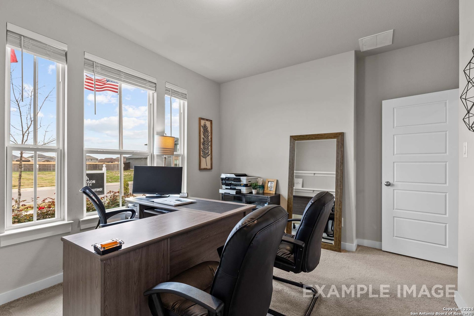 401 Tims Way Seguin, TX 78155 - Photo 30 of 50 a view of a workspace with furniture and a window