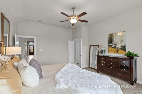 a bathroom with a sink double vanity and a mirror