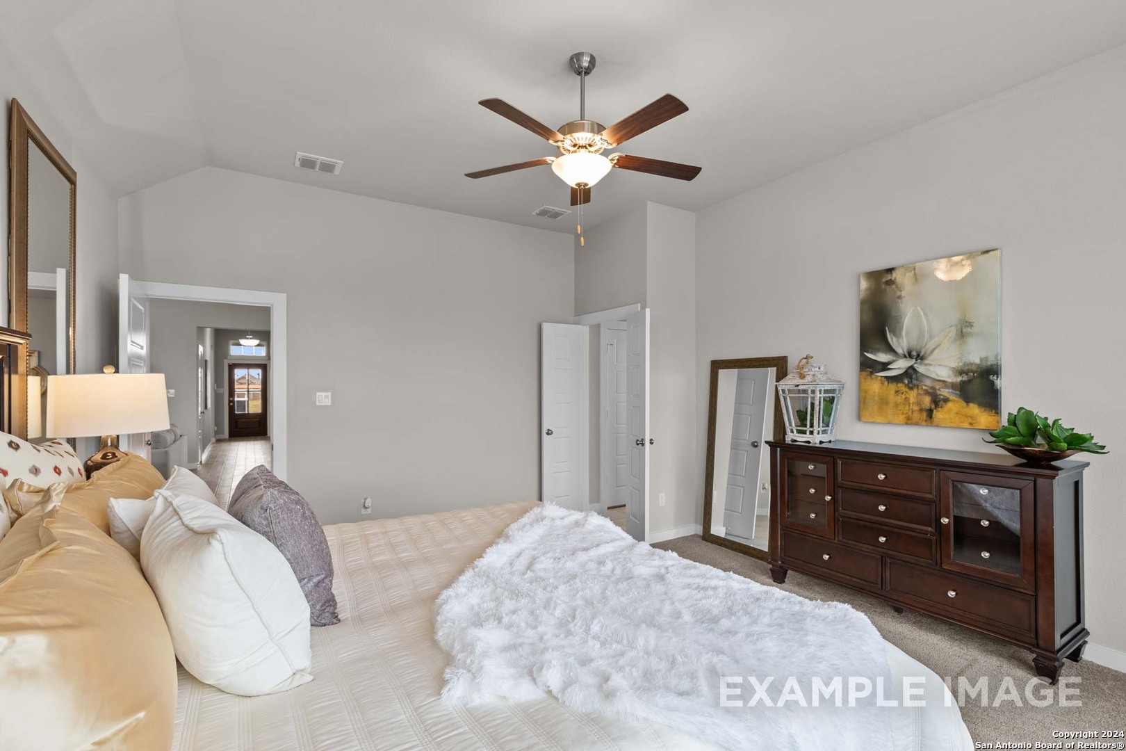 401 Tims Way Seguin, TX 78155 - Photo 33 of 50 a bedroom with a bed and a dresser