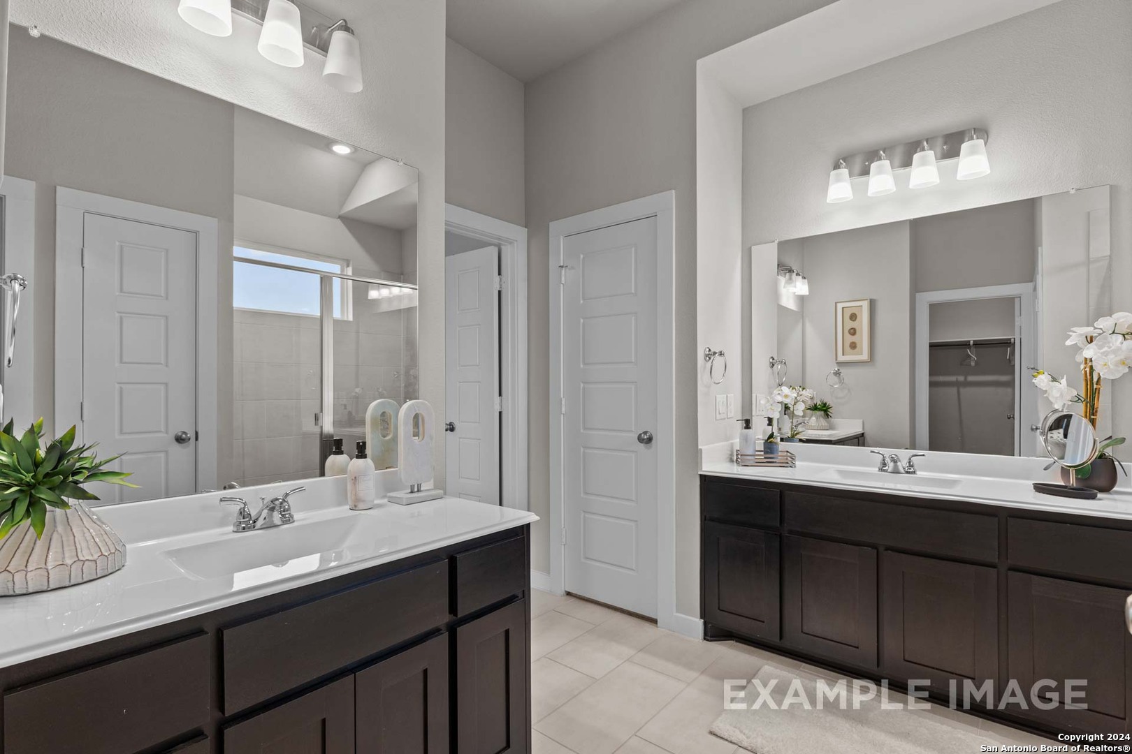 401 Tims Way Seguin, TX 78155 - Photo 35 of 50 a bathroom with a sink double vanity and a mirror