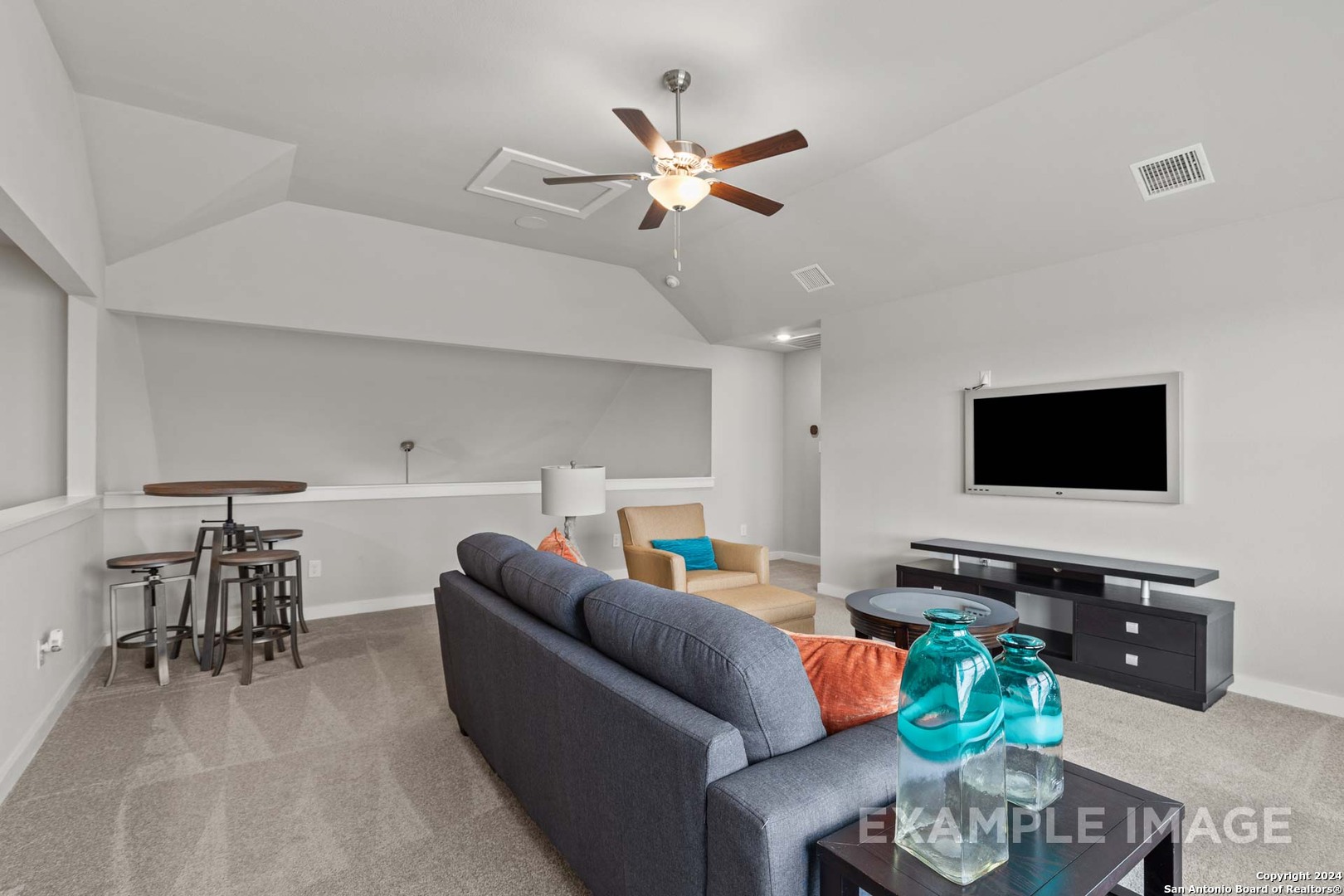 401 Tims Way Seguin, TX 78155 - Photo 39 of 50 a living room with furniture and a flat screen tv