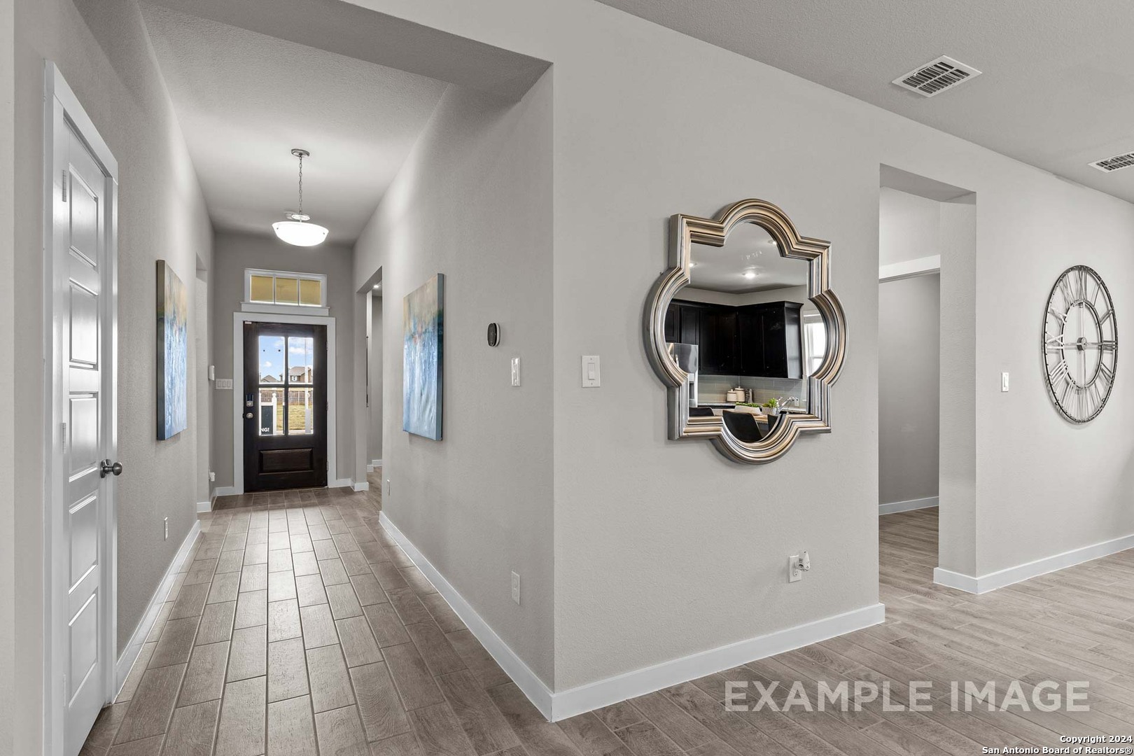 401 Tims Way Seguin, TX 78155 - Photo 7 of 50 a view of a hallway with a workspace