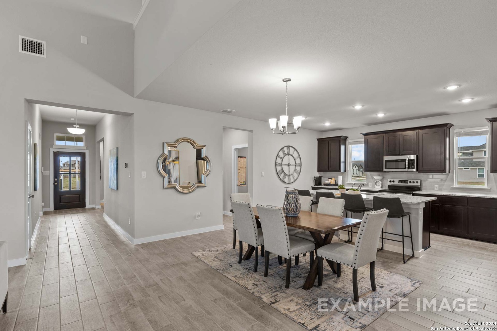 401 Tims Way Seguin, TX 78155 - Photo 9 of 50 a view of a dining room with furniture window and wooden floor