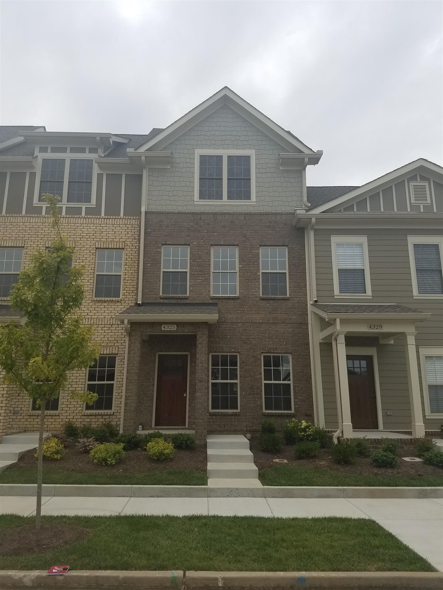 4325 Glassgow Road Spring Hill, TN 37174 - Photo 2 of 28 a front view of a house