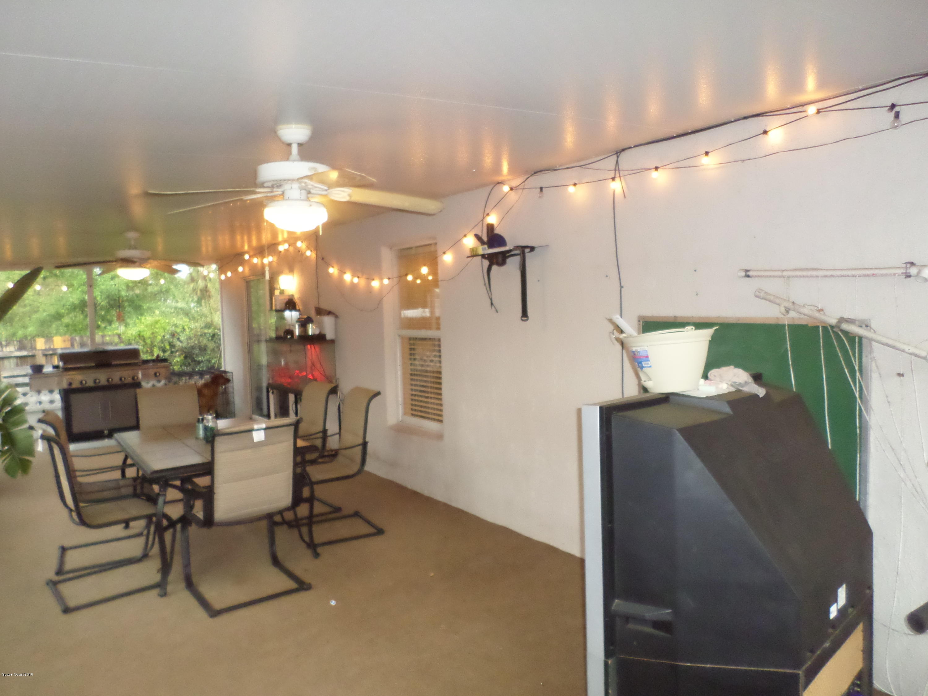6155 Adina Road Cocoa, FL 32927 - Photo 24 of 25 Screend Patio 2