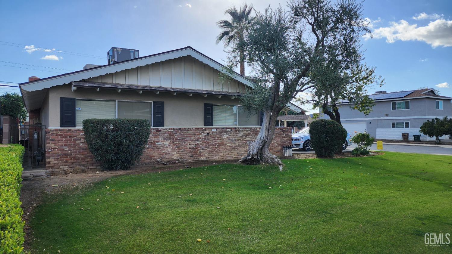Undisclosed Address Bakersfield, CA 93306 - Photo 3 of 20 a view of a house with a yard