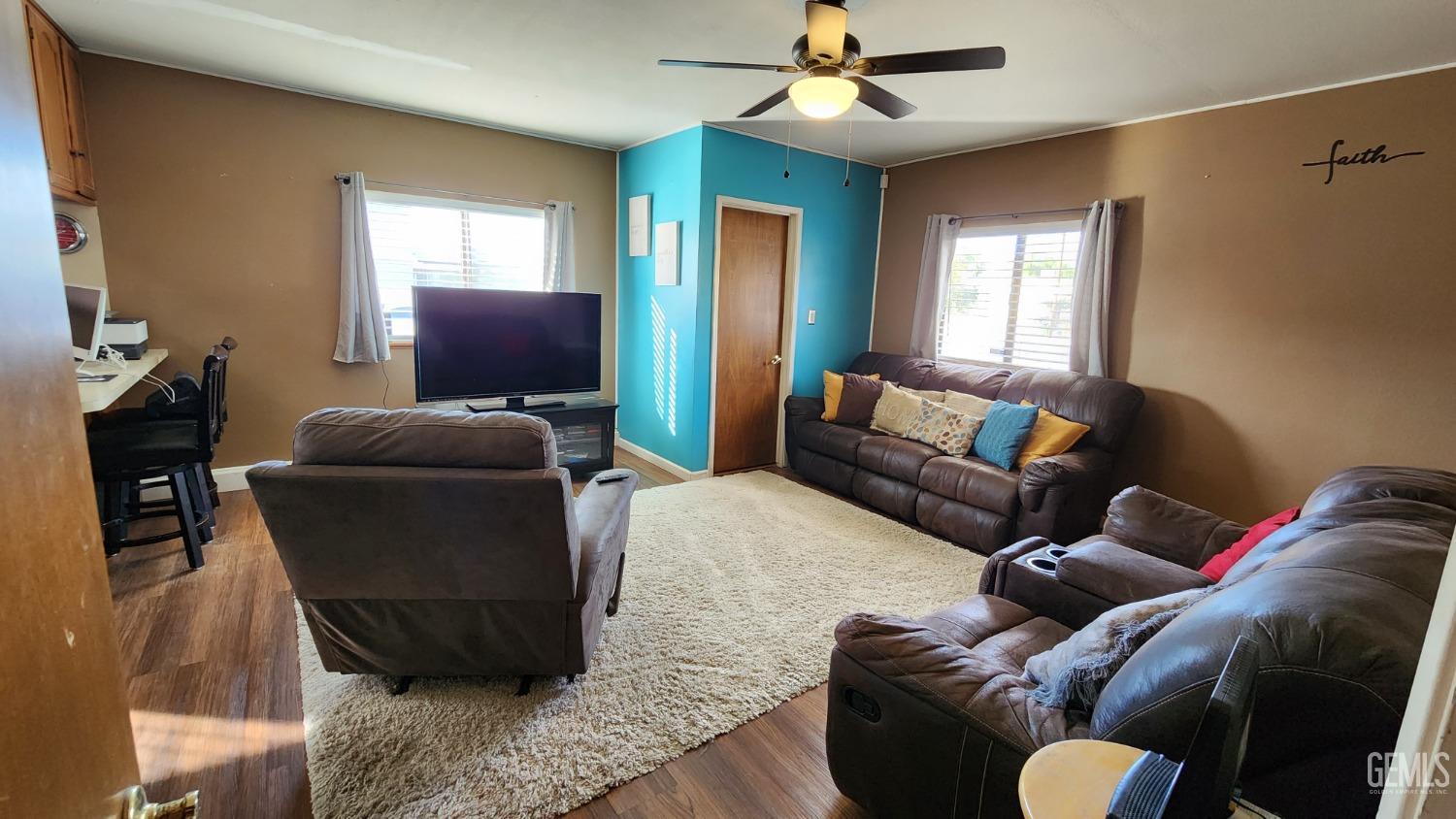 Undisclosed Address Bakersfield, CA 93306 - Photo 8 of 20 a living room with furniture and a window