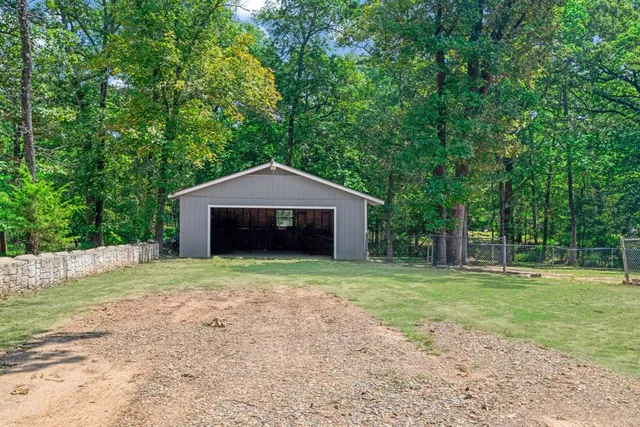 a house with trees in the background