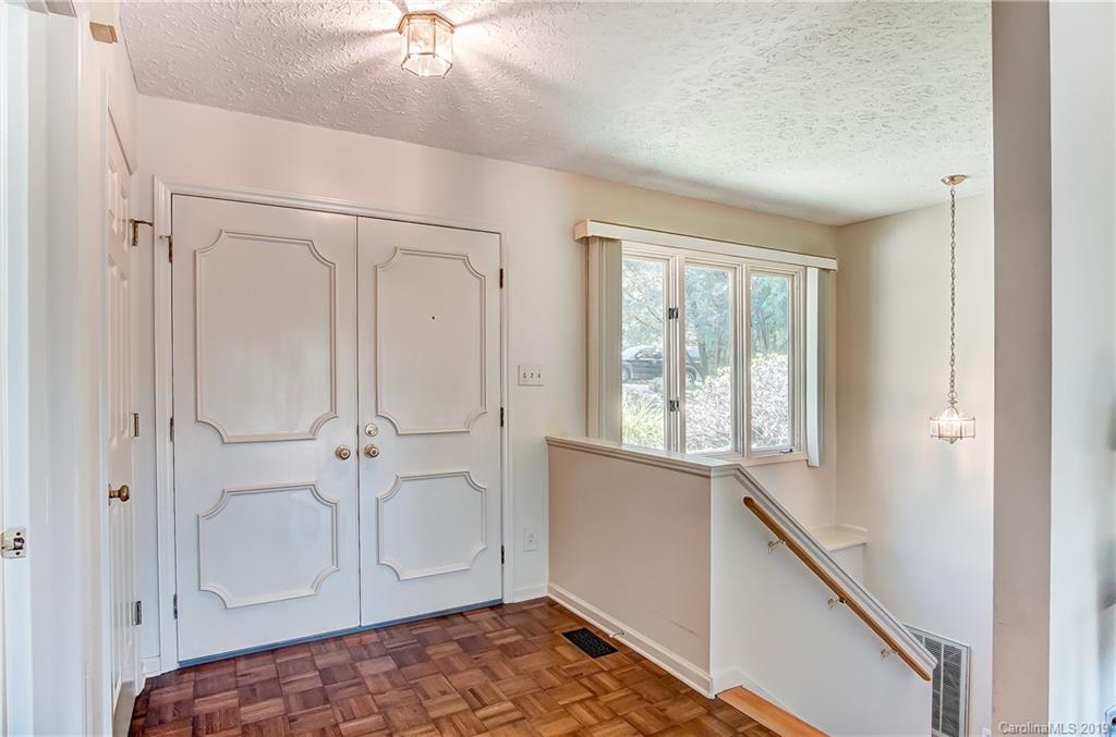 31002 Executive Point Tega Cay, SC 29708 - Photo 5 of 28 a view of an empty room and window