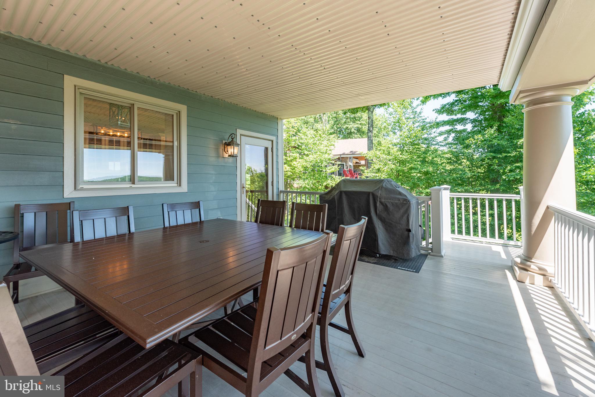 38 Parkside Court North McHenry, MD 21541 - Photo 24 of 60 a view of a dining room with furniture and wooden floor