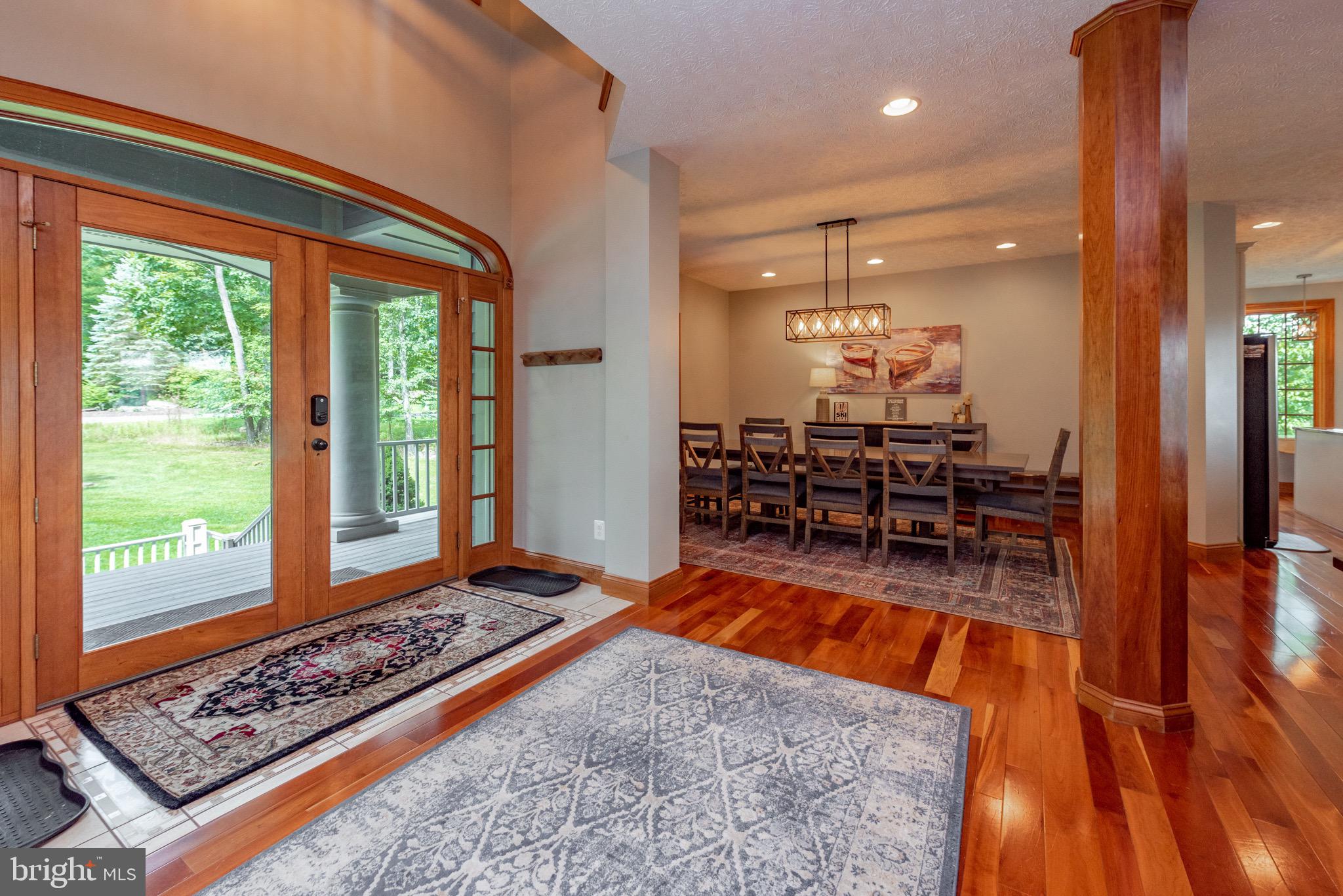 38 Parkside Court North McHenry, MD 21541 - Photo 7 of 60 a living room with furniture rug and a table