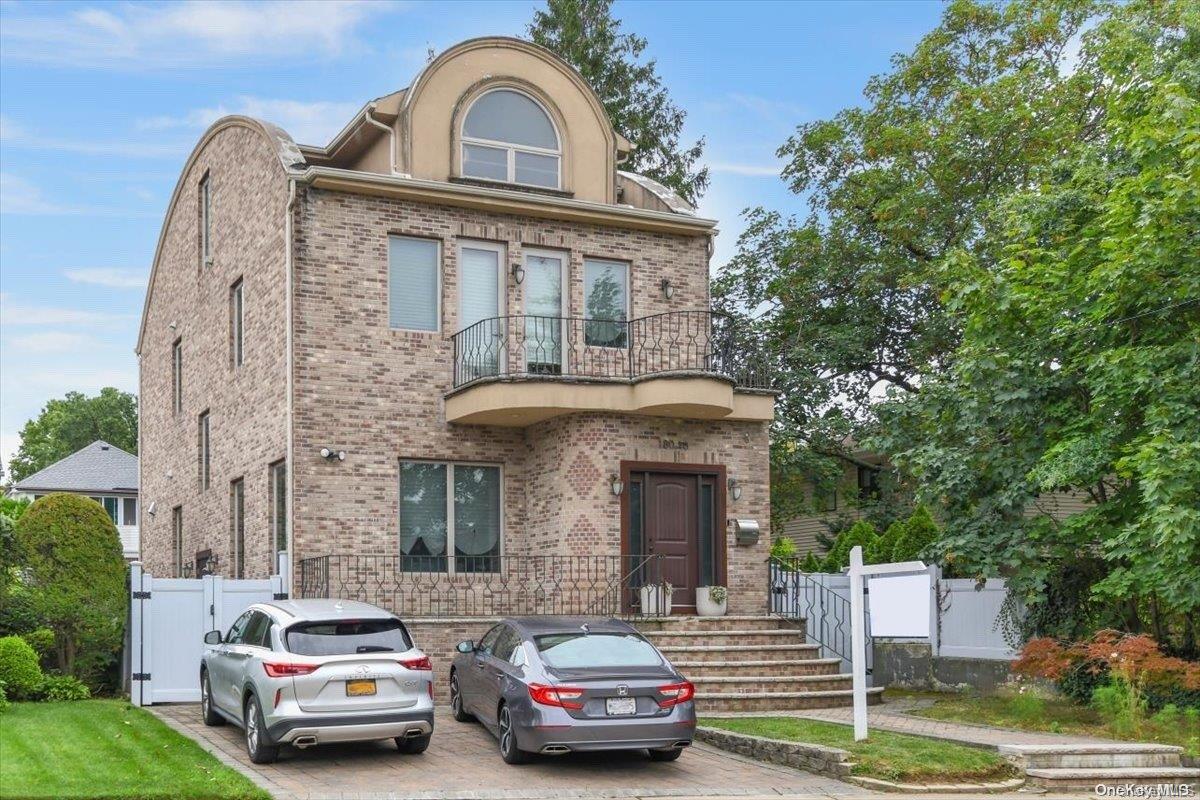 a car parked in front of a house