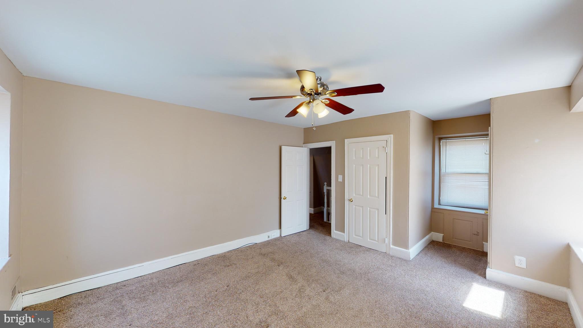 211 Front Street, Unit 3 Bordentown, NJ 08505 - Photo 1 of 9 a view of a livingroom with a ceiling fan
