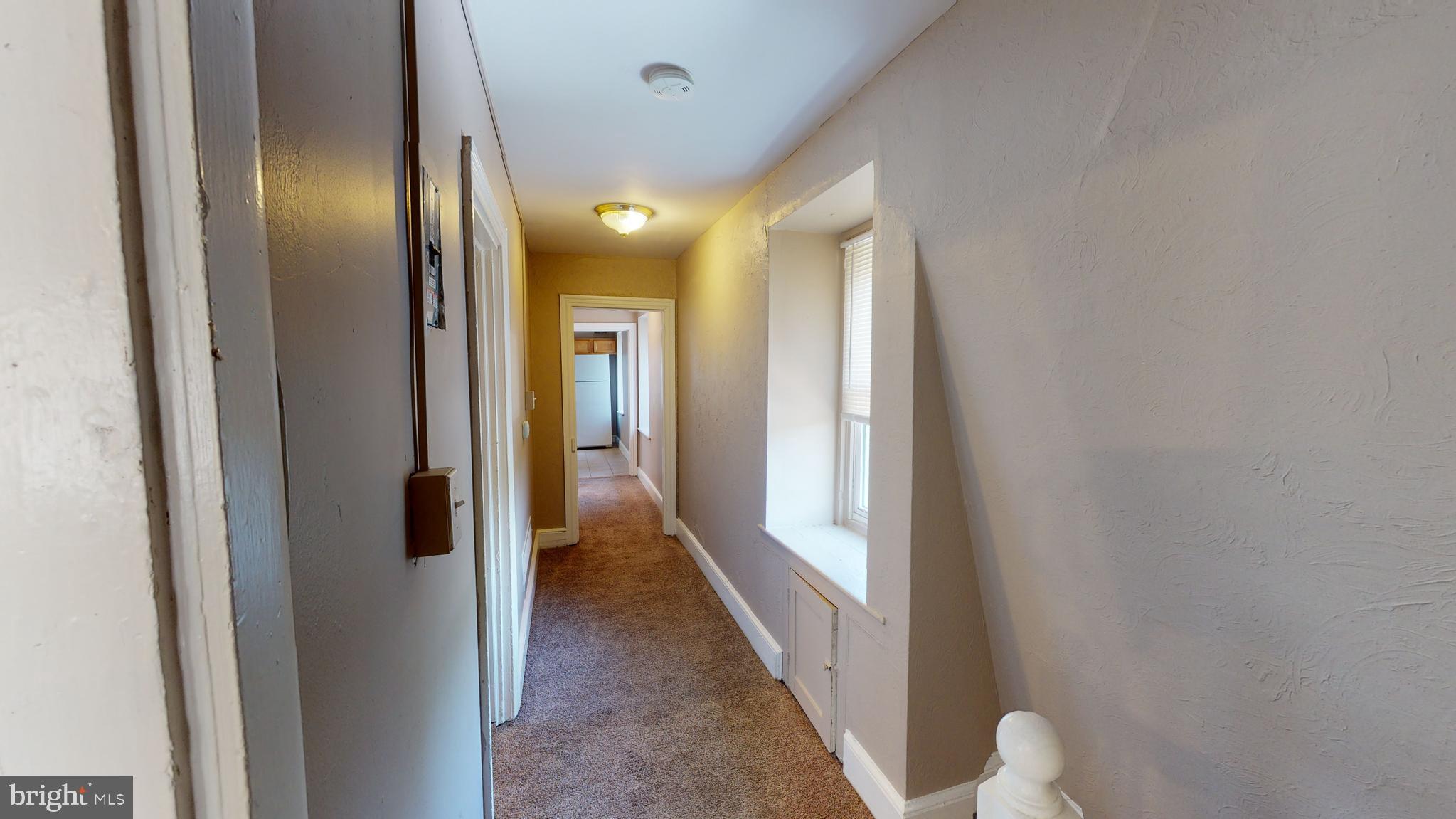 211 Front Street, Unit 3 Bordentown, NJ 08505 - Photo 2 of 9 a view of hallway with elevator