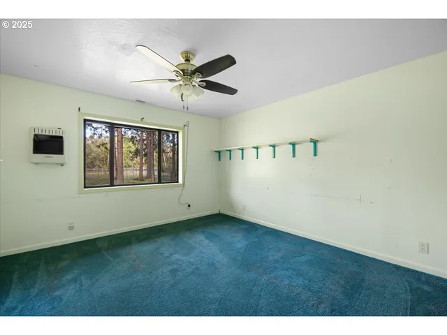 a view of an empty room with window