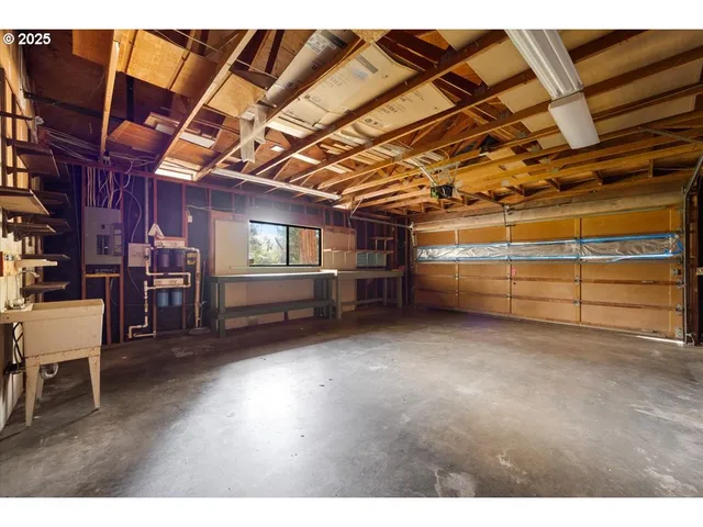 a view of a room with wooden furniture