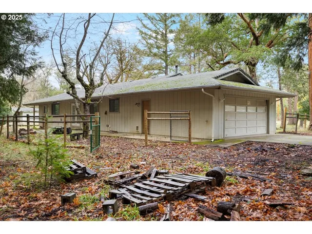 a backyard of a house with lots of green space