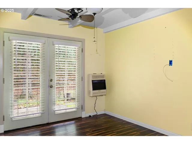 a view of an entryway with a wooden floor