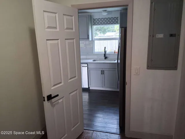 a bathroom with a sink and mirror