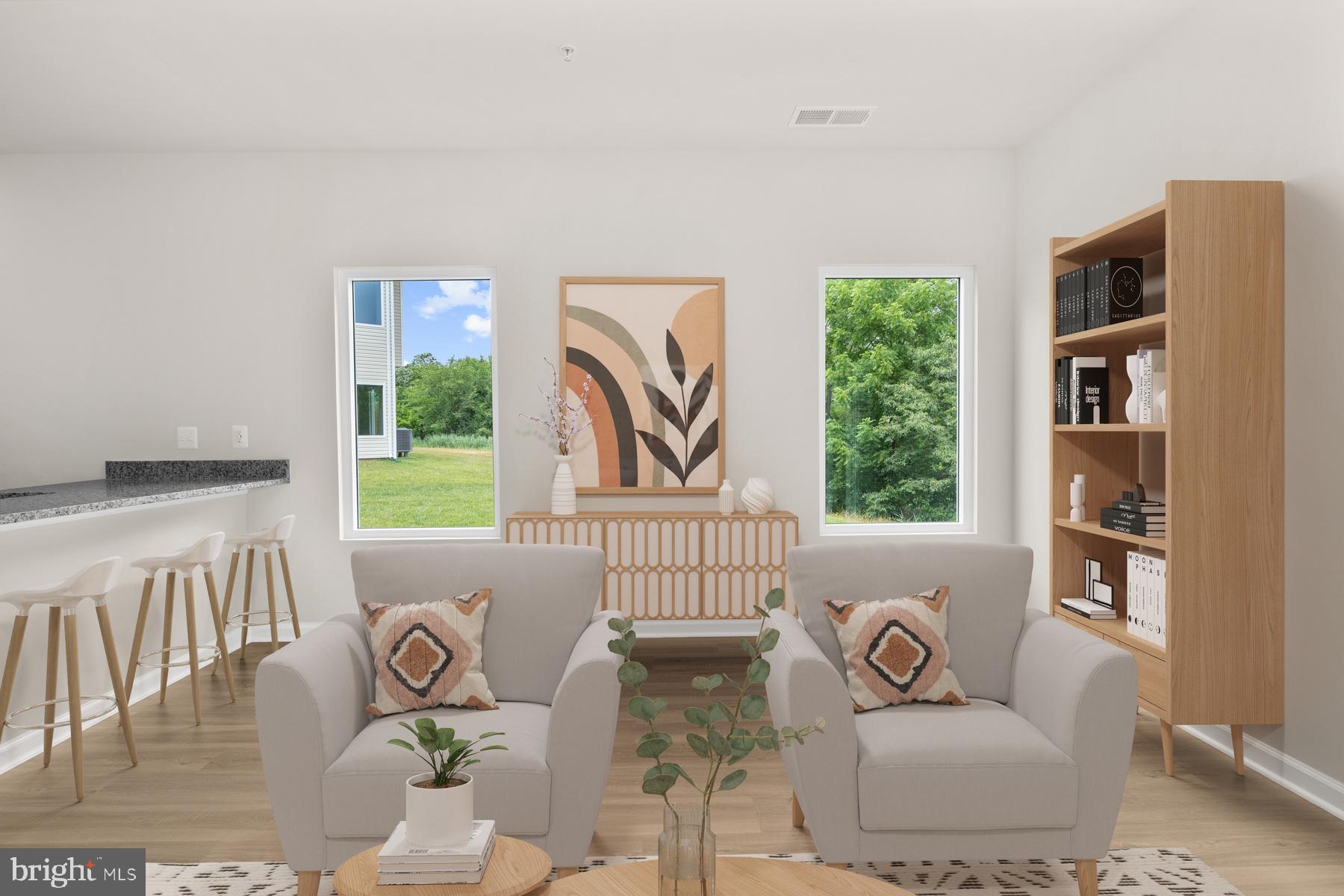 8141 Bartholomew Court Baltimore, MD 21206 - Photo 13 of 18 a living room with furniture and a window