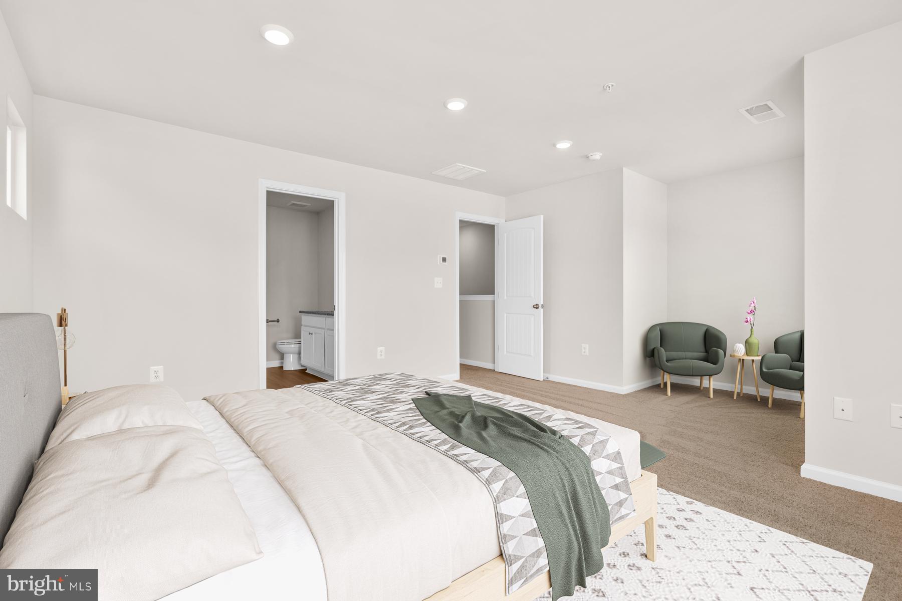 8141 Bartholomew Court Baltimore, MD 21206 - Photo 15 of 18 a bedroom with a bed and furniture