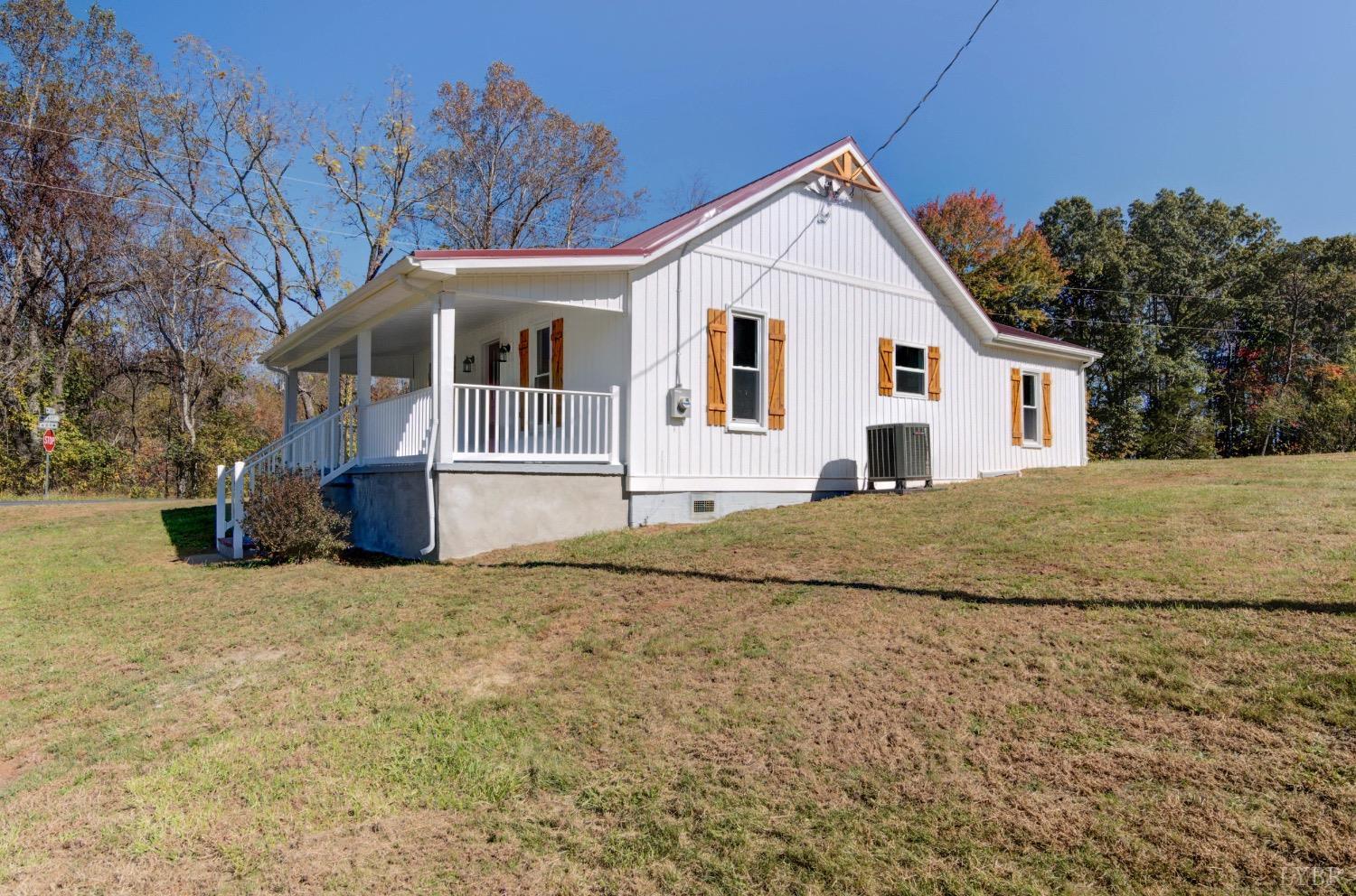 234 Baileys Sawmill Road Amherst, VA 24521 - Photo 27 of 32 a front view of a house with a yard