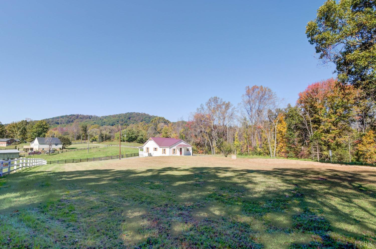 234 Baileys Sawmill Road Amherst, VA 24521 - Photo 29 of 32 a view of grassy field with mountain