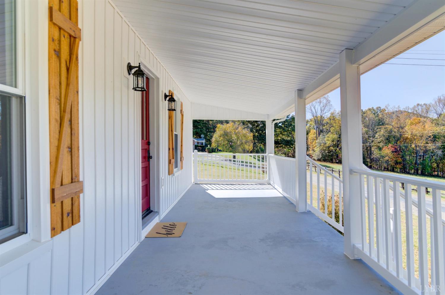 234 Baileys Sawmill Road Amherst, VA 24521 - Photo 3 of 32 a view of a porch with wooden floor and outdoor space