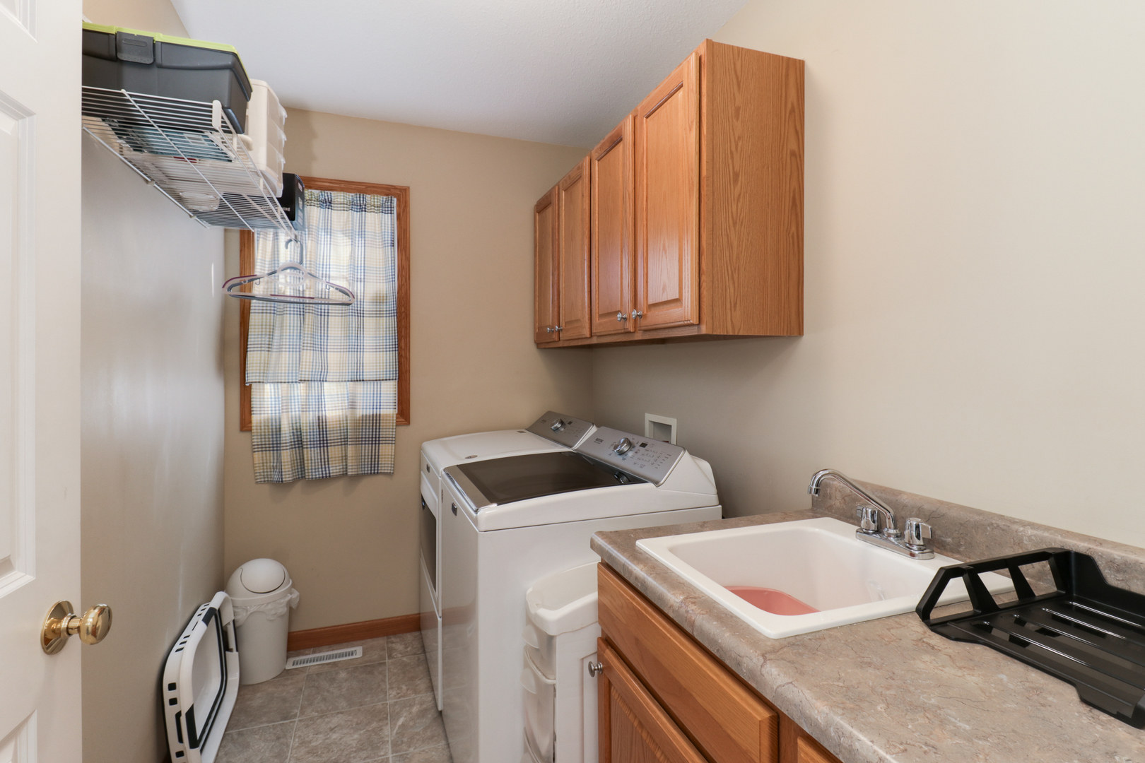 2374 Heather Ridge Drive Normal, IL 61761 - Photo 12 of 31 a utility room with dryer and washer