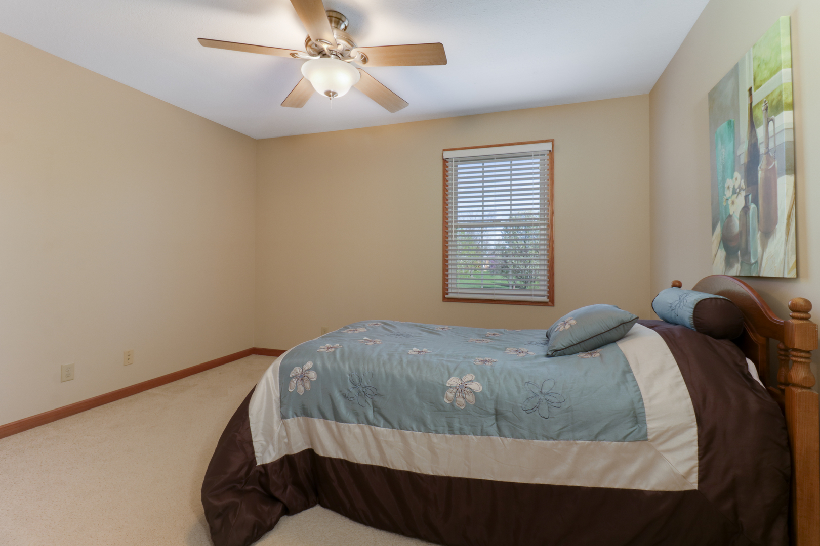 2374 Heather Ridge Drive Normal, IL 61761 - Photo 22 of 31 a bedroom with a bed and window