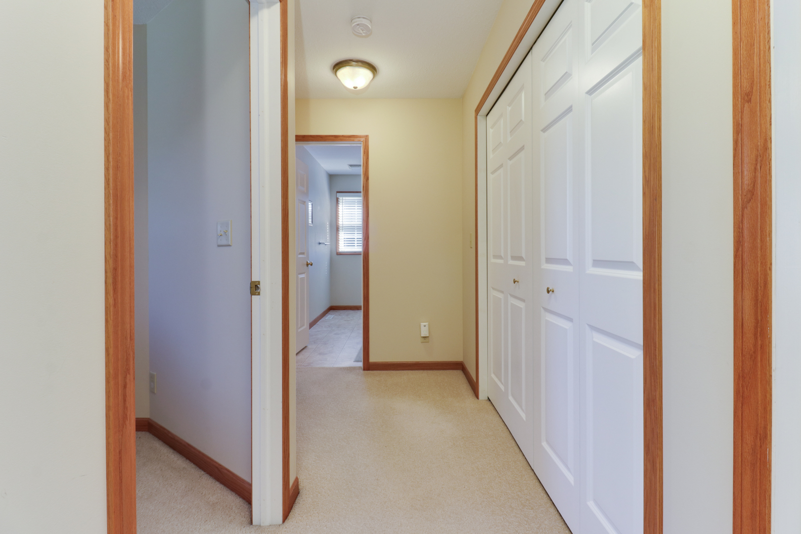 2374 Heather Ridge Drive Normal, IL 61761 - Photo 25 of 31 a view of a hallway with wooden floor