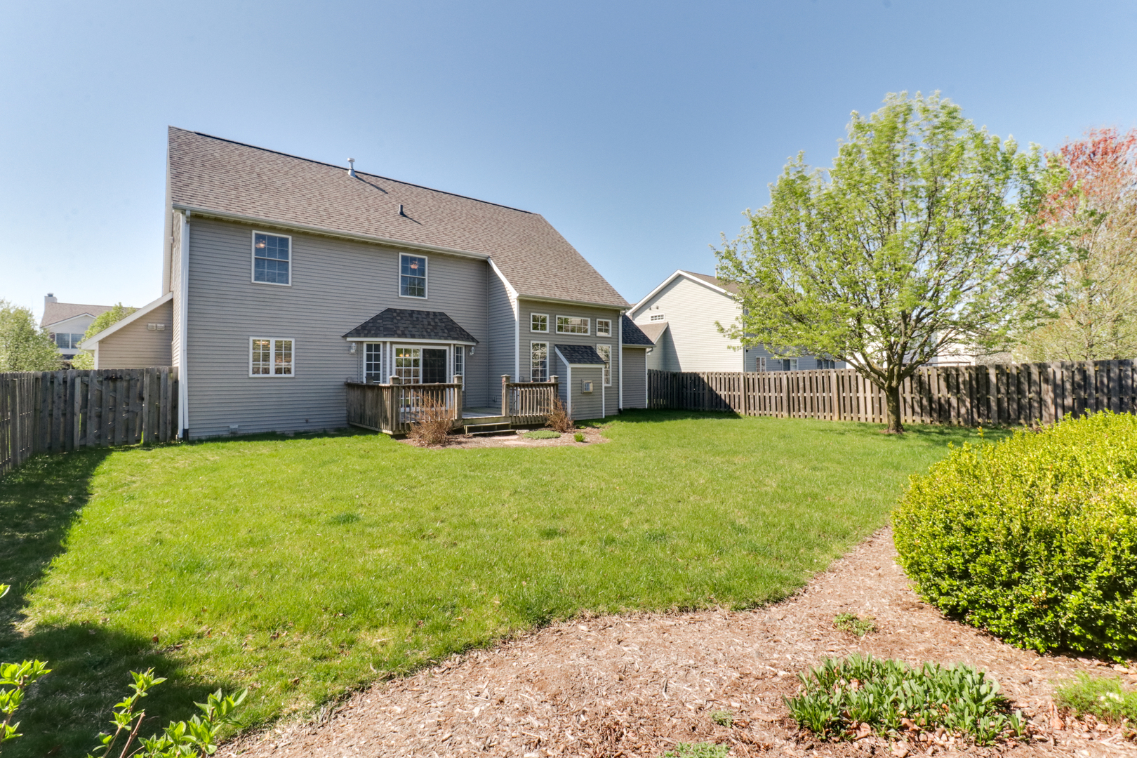 2374 Heather Ridge Drive Normal, IL 61761 - Photo 29 of 31 a front view of house with a garden