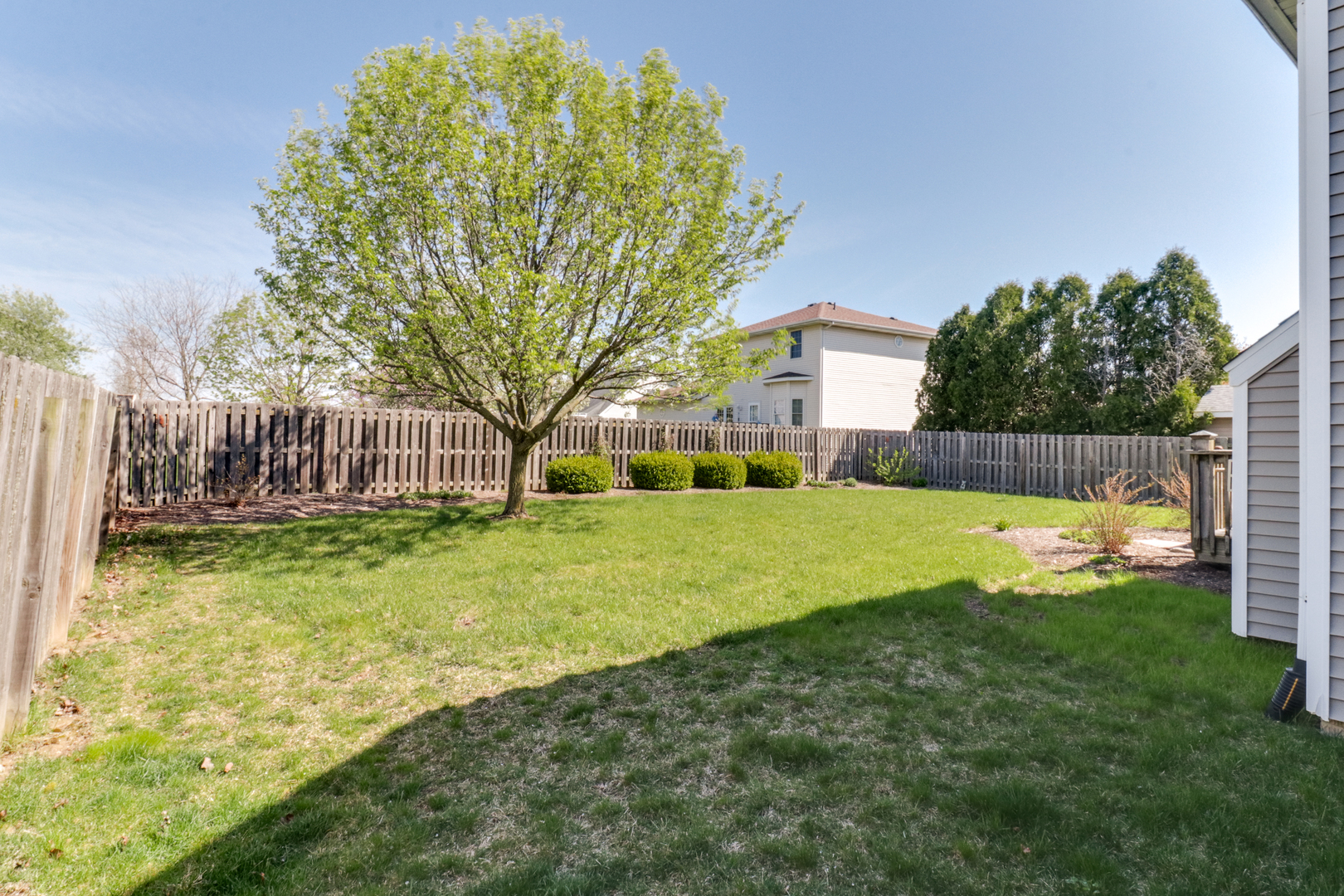 2374 Heather Ridge Drive Normal, IL 61761 - Photo 31 of 31 a view of a house with a big yard