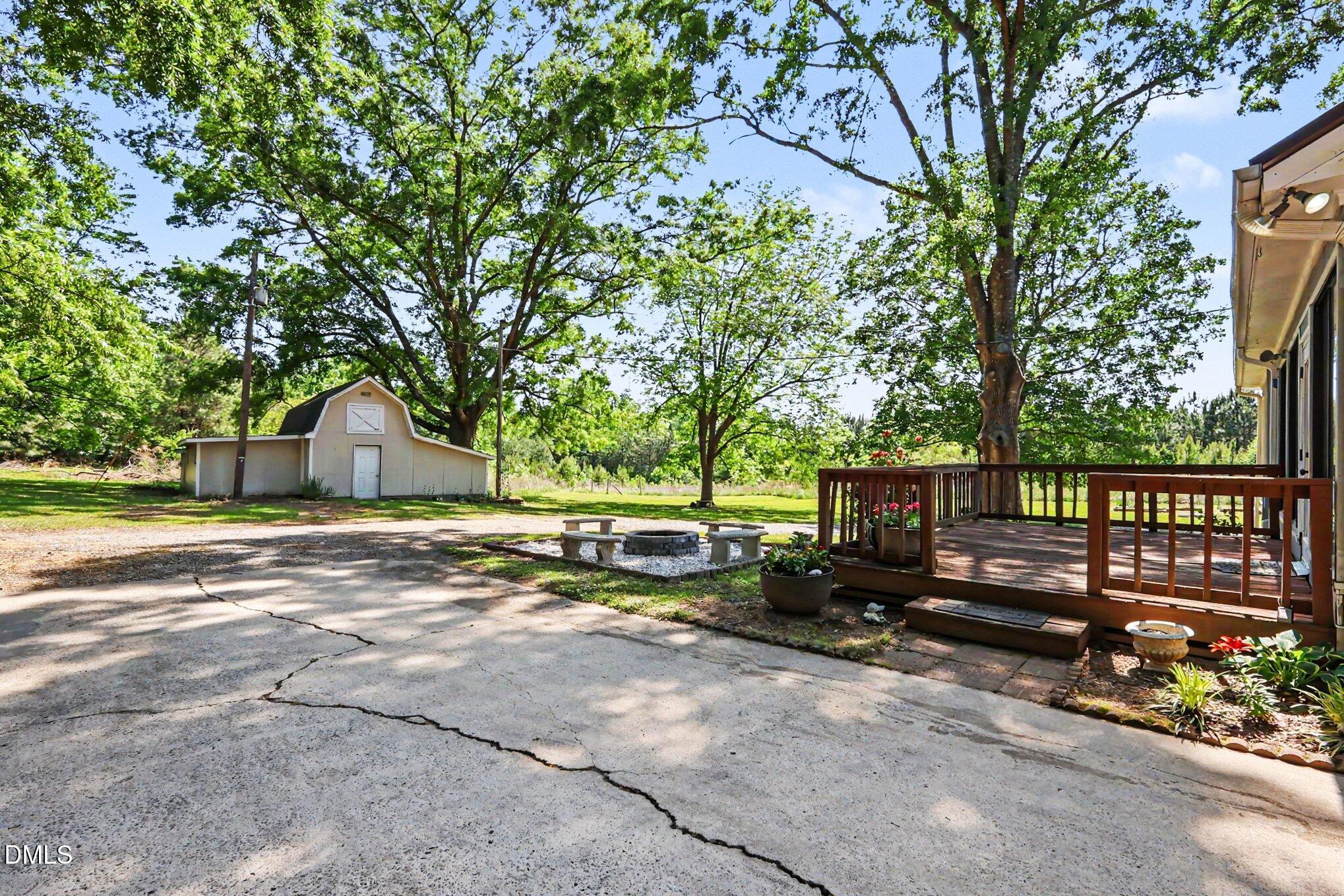 779 Steel Bridge Road Sanford, NC 27330 - Photo 29 of 37 Rear deck outbuilding