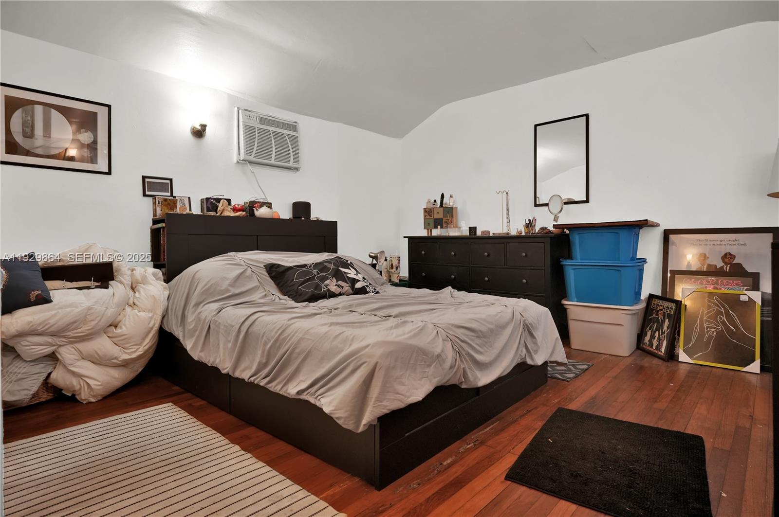 512 Southwest 21st Avenue Miami, FL 33135 - Photo 25 of 33 a bedroom with a bed and a view of kitchen