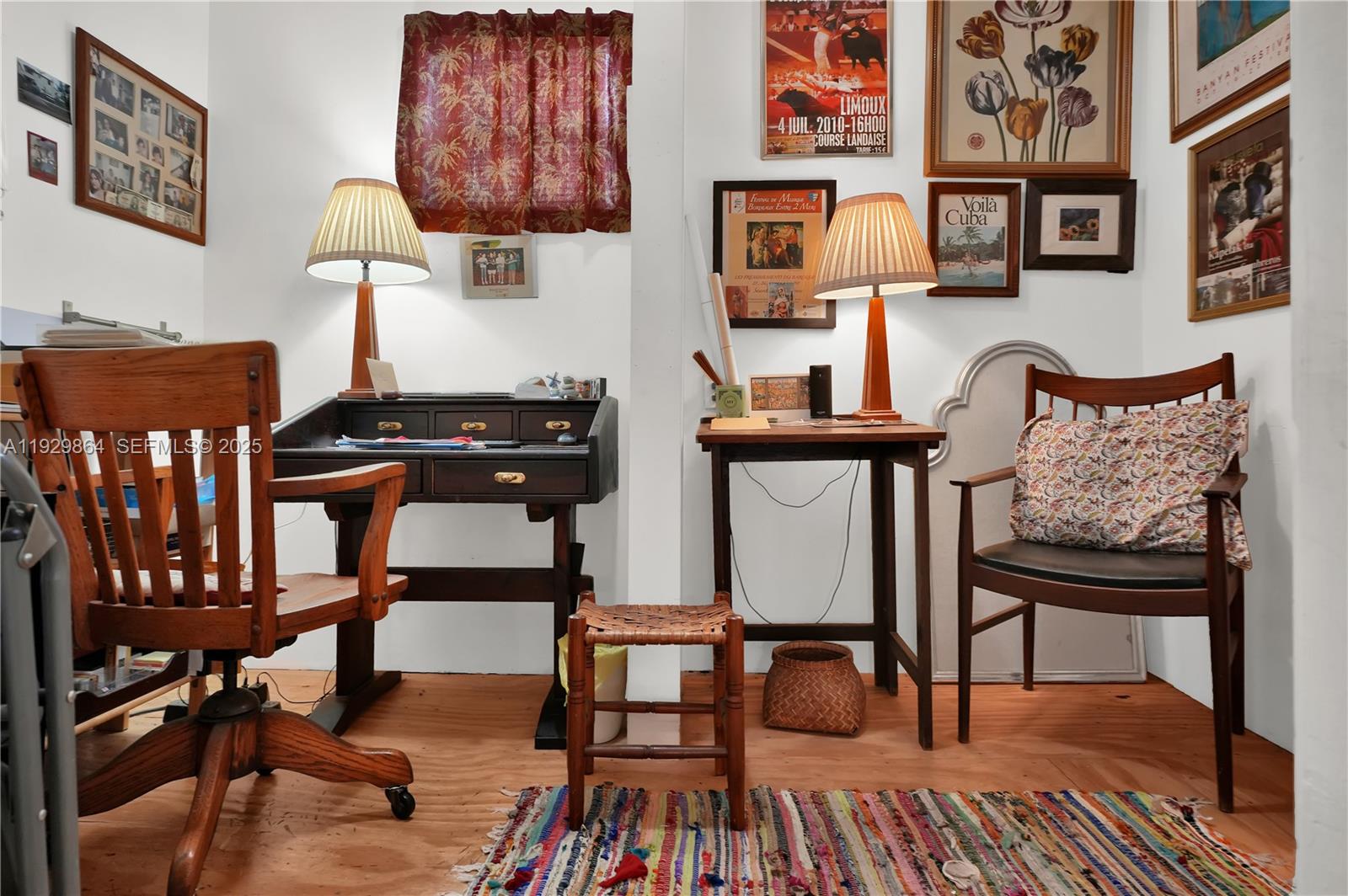 512 Southwest 21st Avenue Miami, FL 33135 - Photo 28 of 33 a view of a workspace with furniture and wooden floor